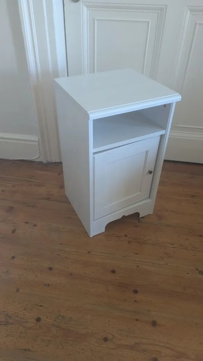 White beside locker - Image 1