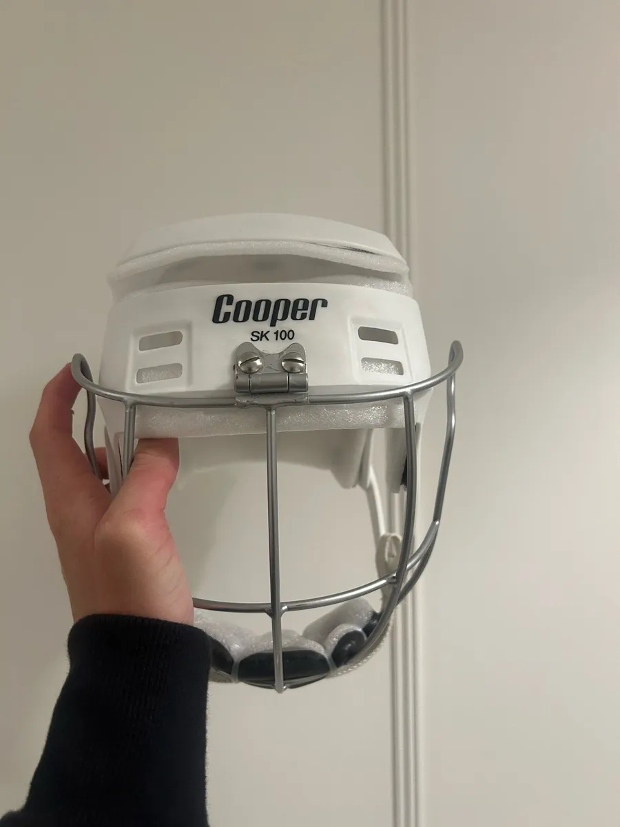 White Cooper SK100 Hurling Helmet - Image 1