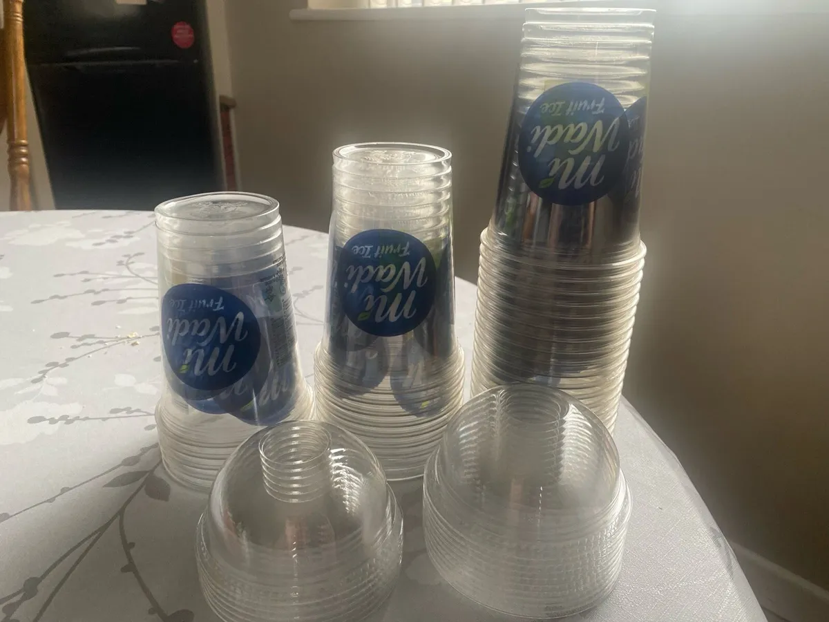 Plastic drinks containers for sale with lids - Image 1