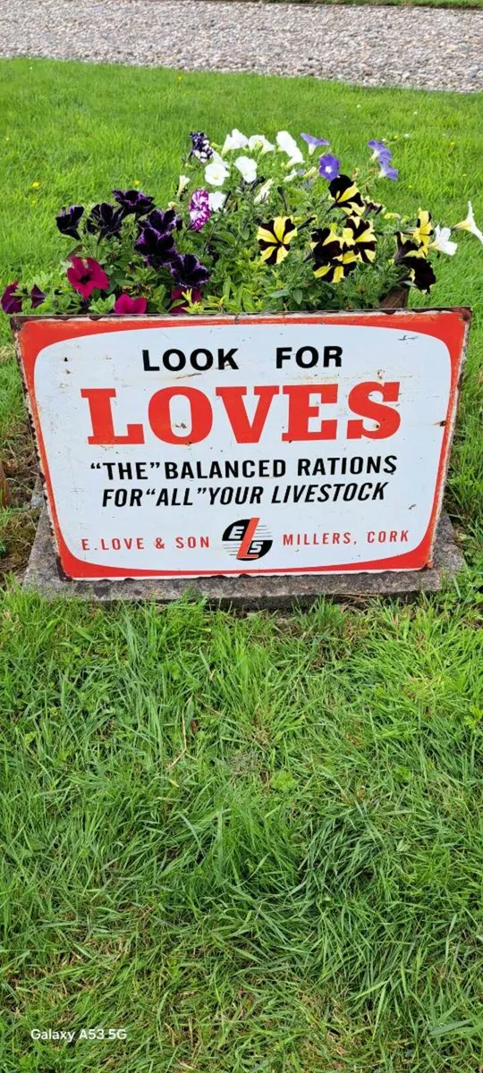 Large  Loves live stock metal sign