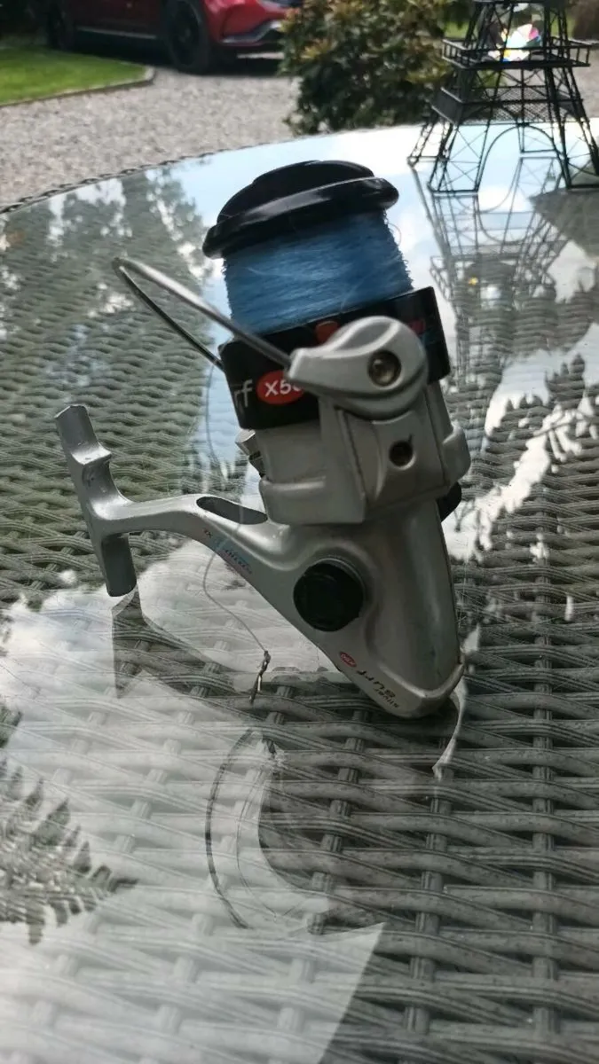 Silver Surf 2XL fishing reel, post 6e, D18 - Image 1