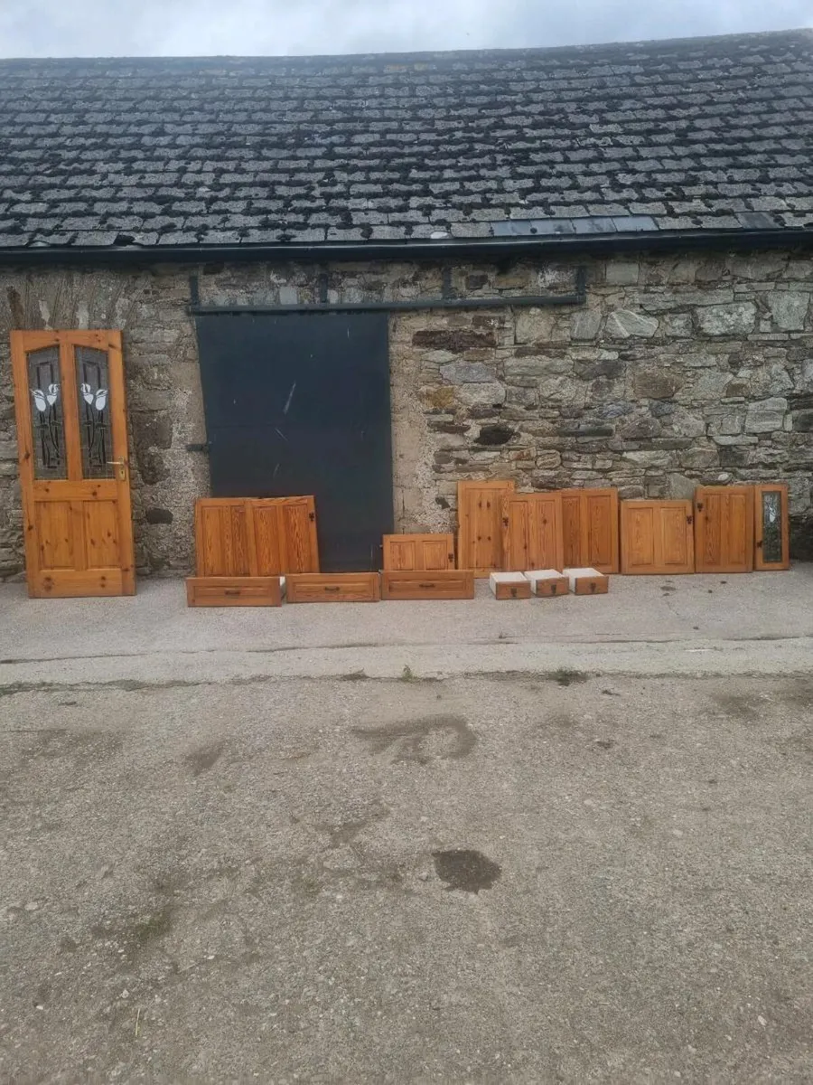 A kitchen with a full size stain glass door - Image 1