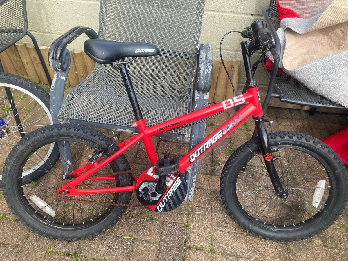 Childs red bike