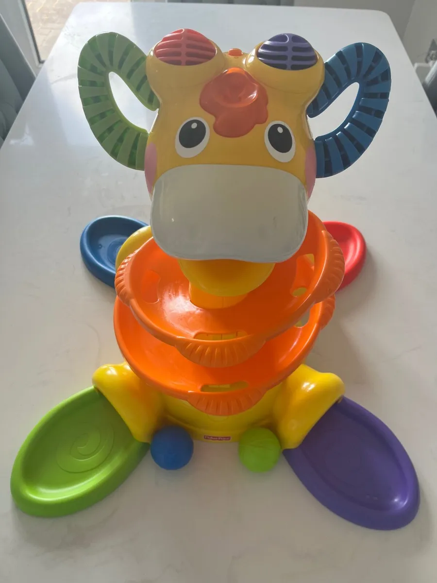 Musical Toy - Spin & Giggle Giraffe Ball Popper