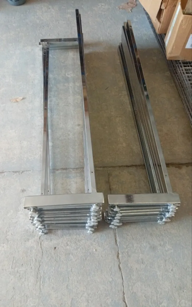 Pair of heavy duty 'L' legs for gridwall panels. - Image 1