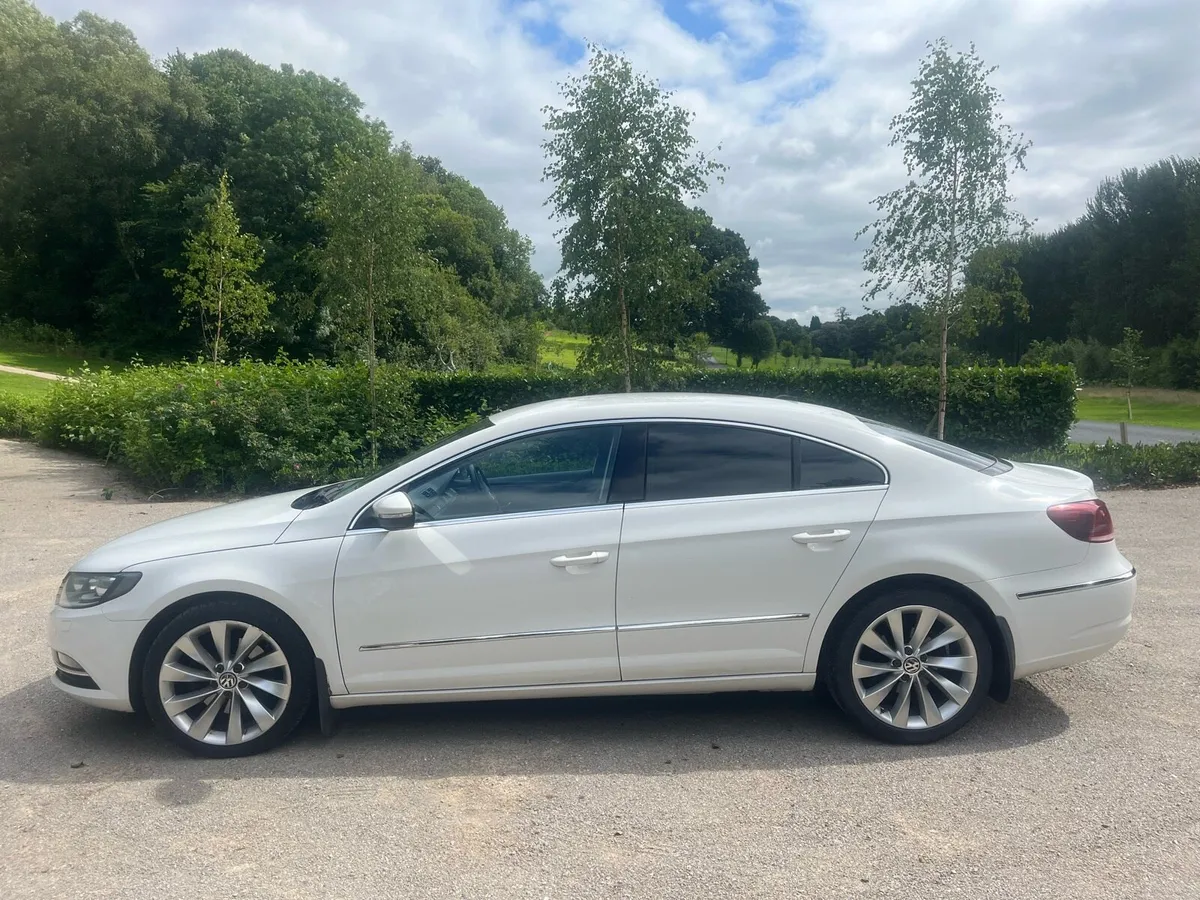 White CC VW Passat. - Image 2
