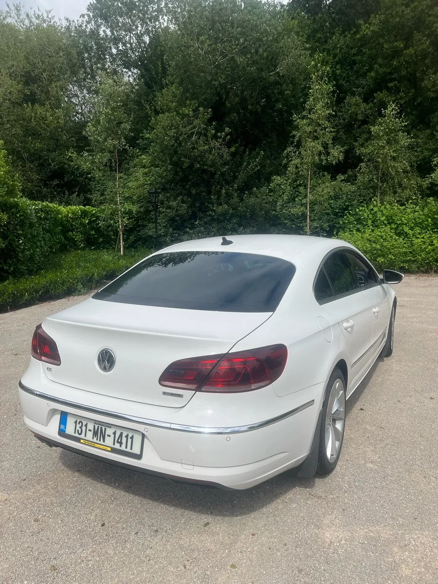 White CC VW Passat. - Image 3