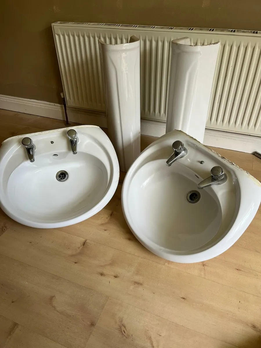 2 sinks and pedestals