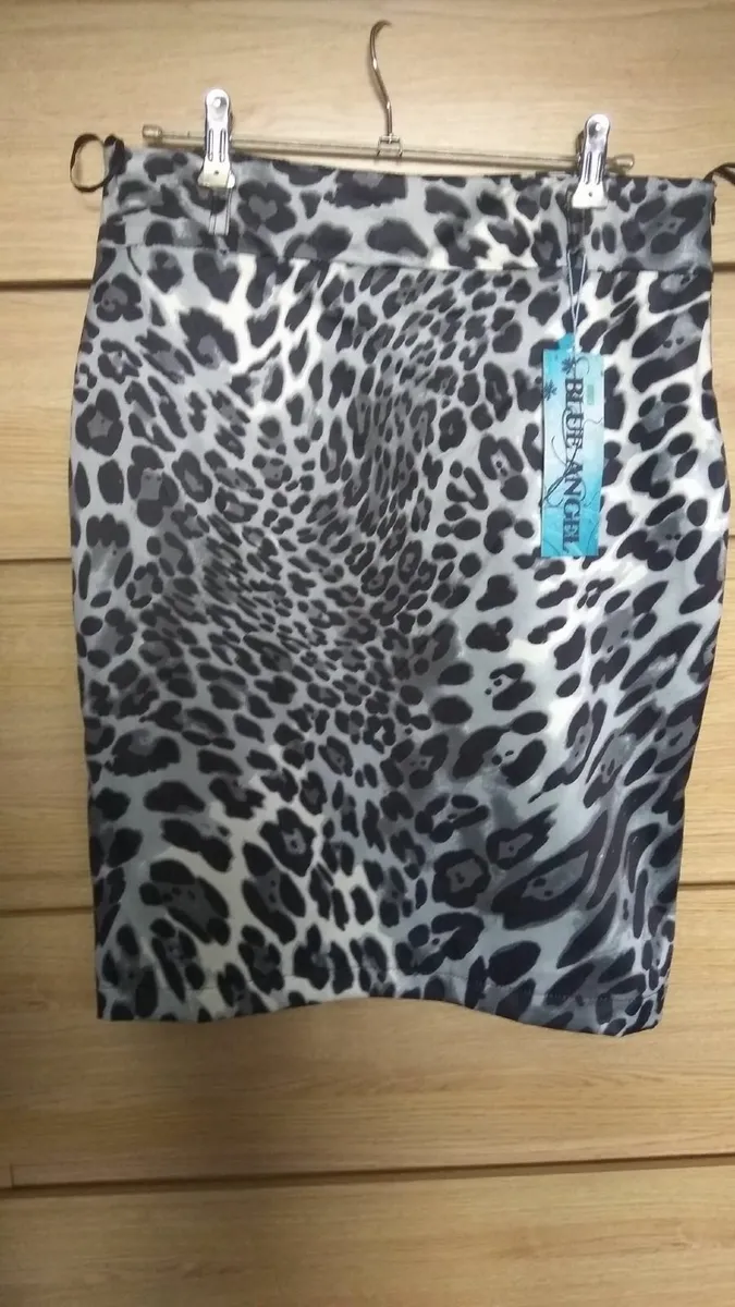 Animal print skirt size s-m satin look new with ta