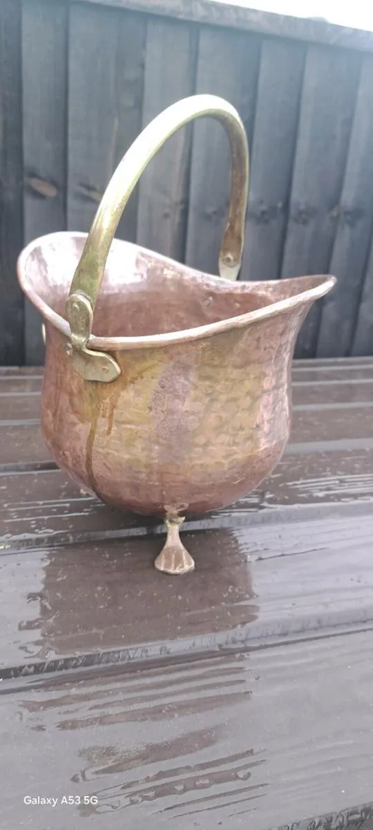Old  copper  coal  bin