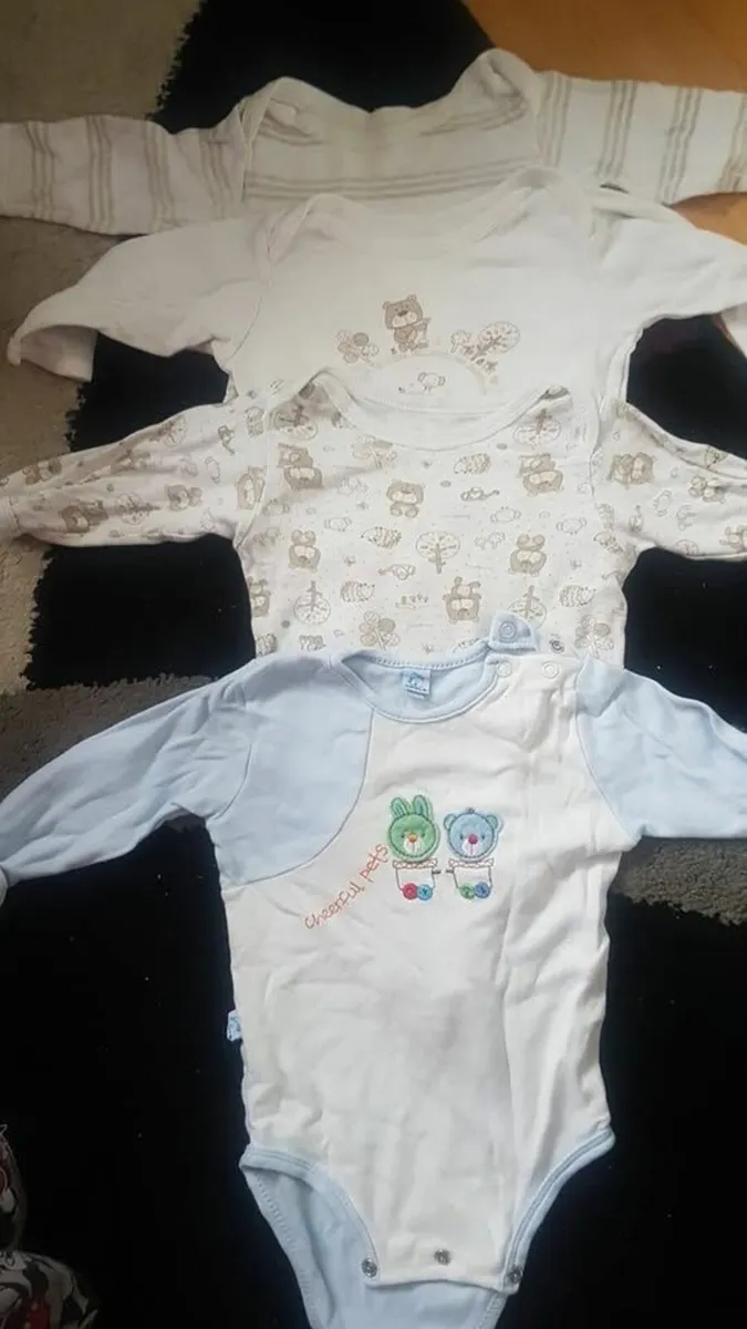 6-9 months bodysuit  4 eur each