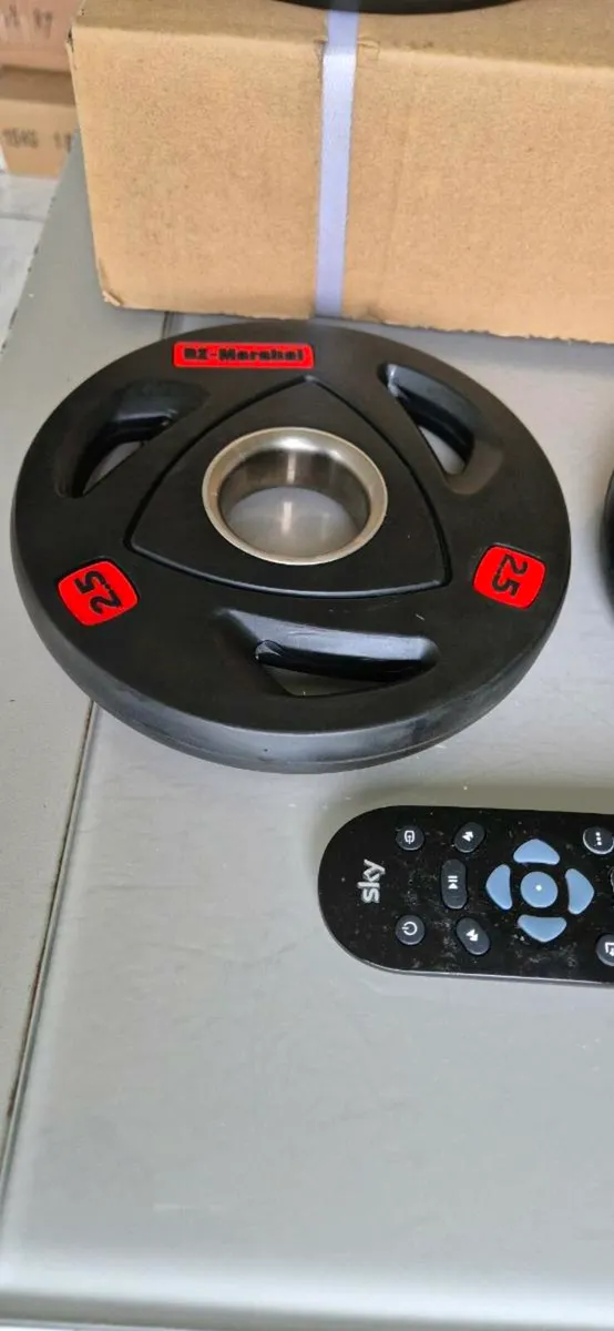 Brand new 4x2.5 kilo Olympic weight plates - Image 3
