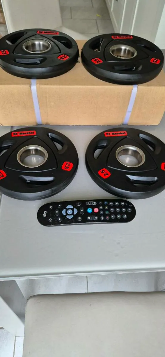 Brand new 4x2.5 kilo Olympic weight plates - Image 4