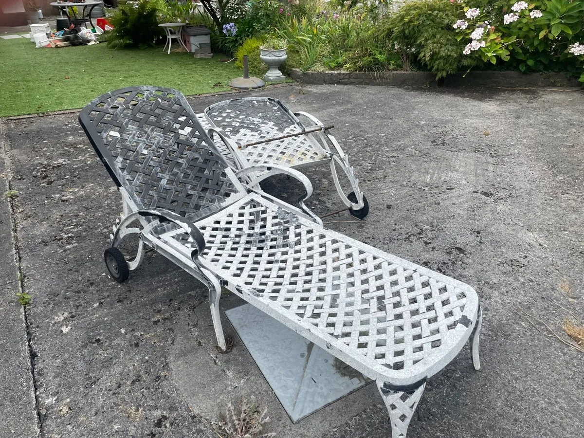 2 metal garden loungers needing restoration