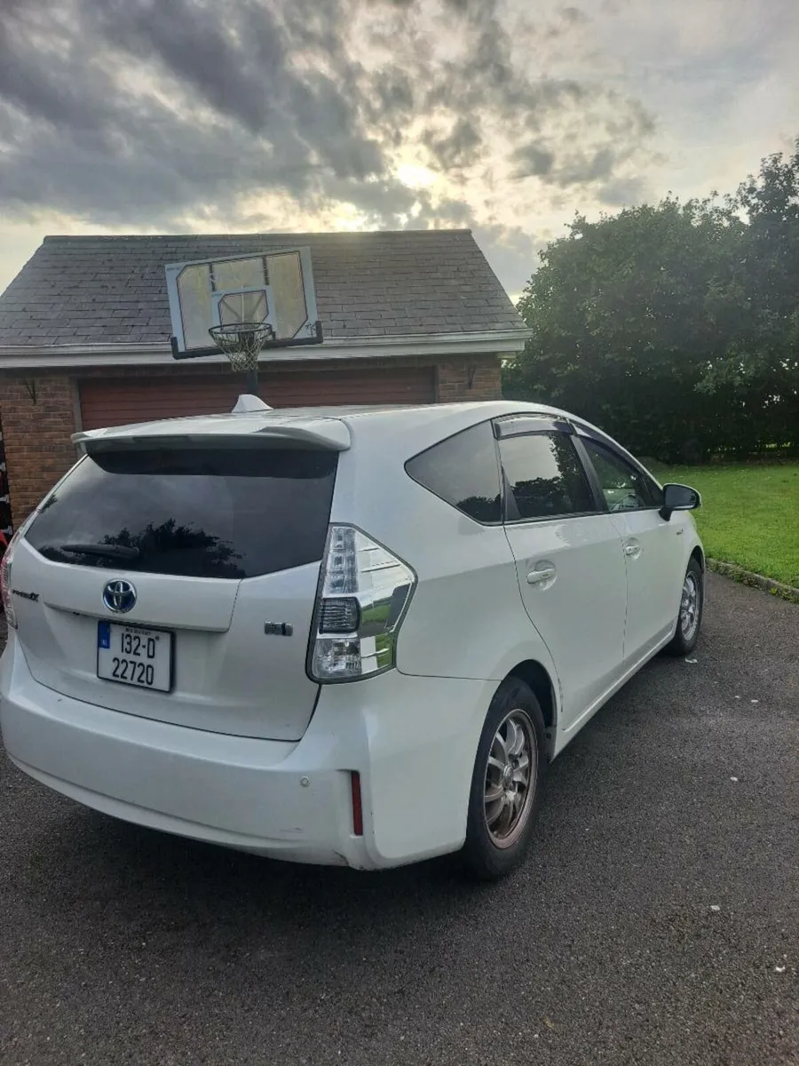RESERVED 132 Prius - 7 seater - Image 1