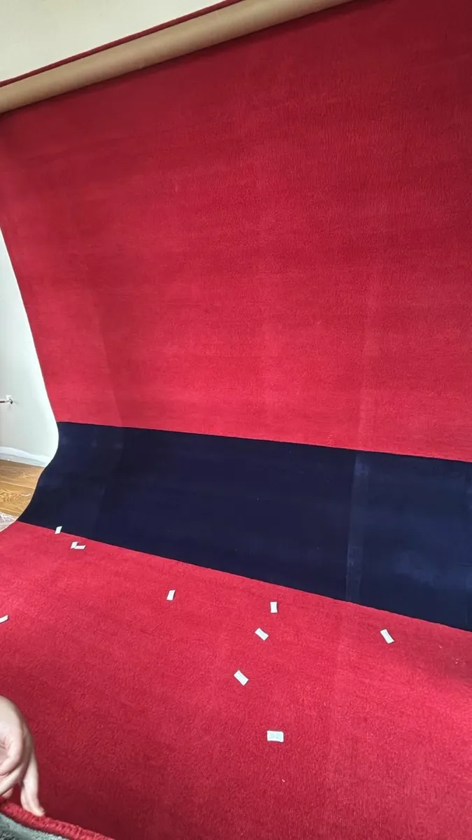 REDUCED   LARGE RED AND NAVY RUG NEW - Image 1
