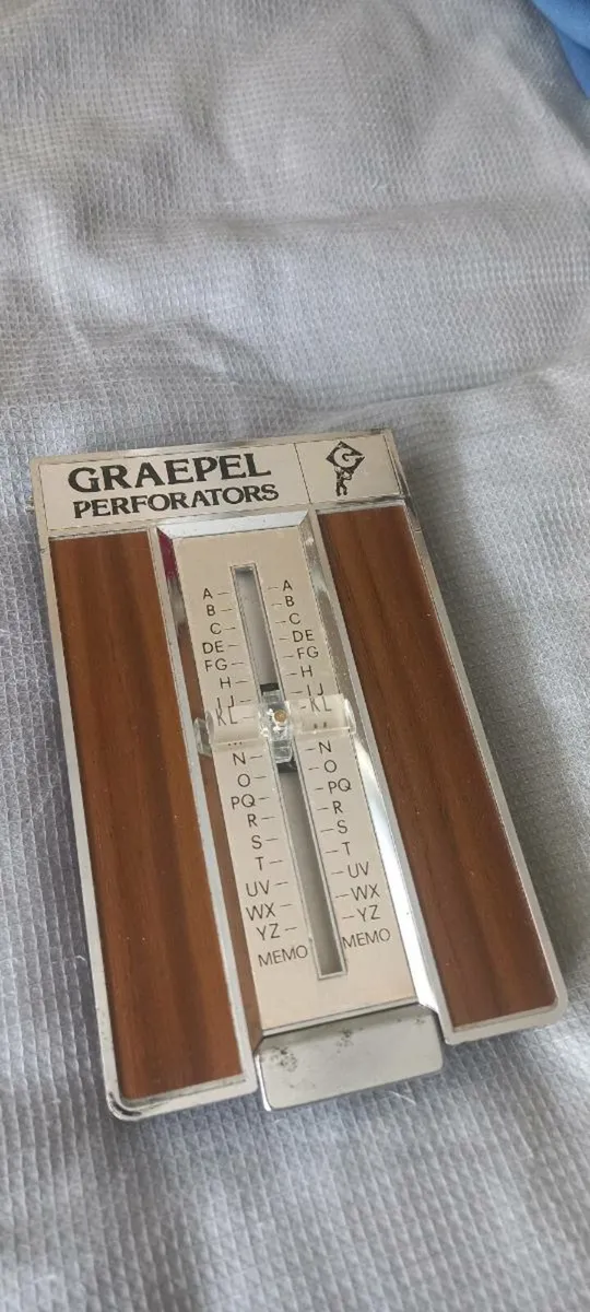 Vintage Japan made flip-open slide address phone - Image 1