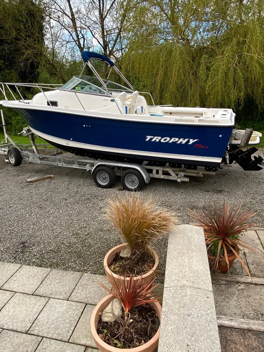 Trophy boat 2352.  New engine and out unit… - Image 1