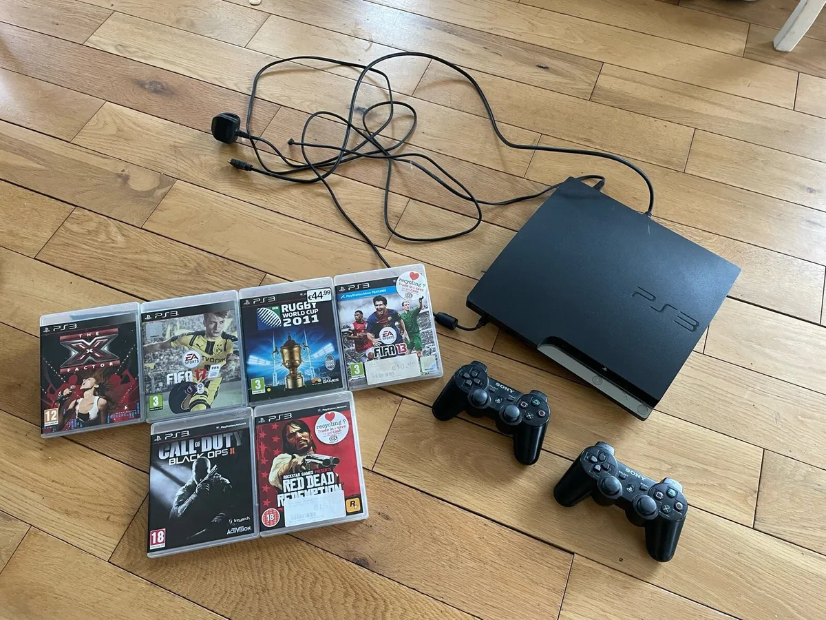 Sony PlayStation 3 with Games & 2 controllers - Image 1