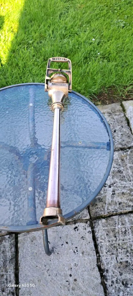 Old brass  copper  fire  mans  hose - Image 1