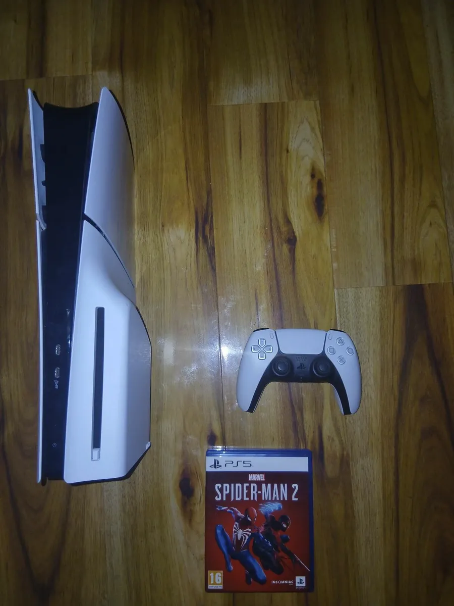 Ps5 and a game and controller - Image 2