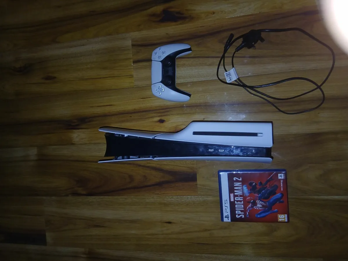 Ps5 and a game and controller - Image 3
