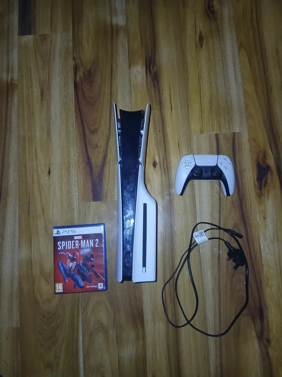 Ps5 and a game and controller - Image 4
