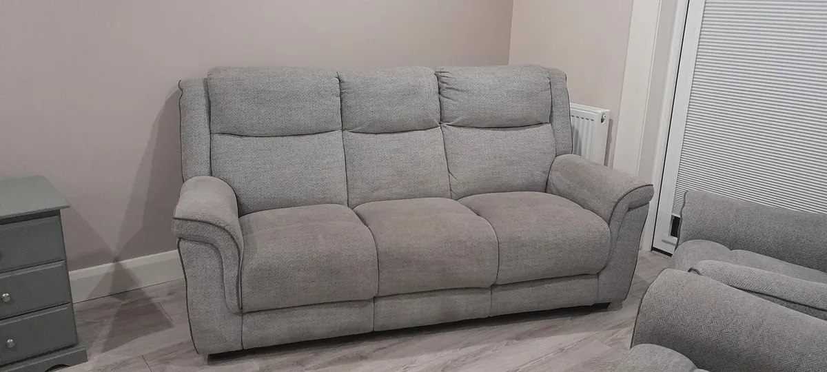 Grey sofa and two reclining chairs - Image 1