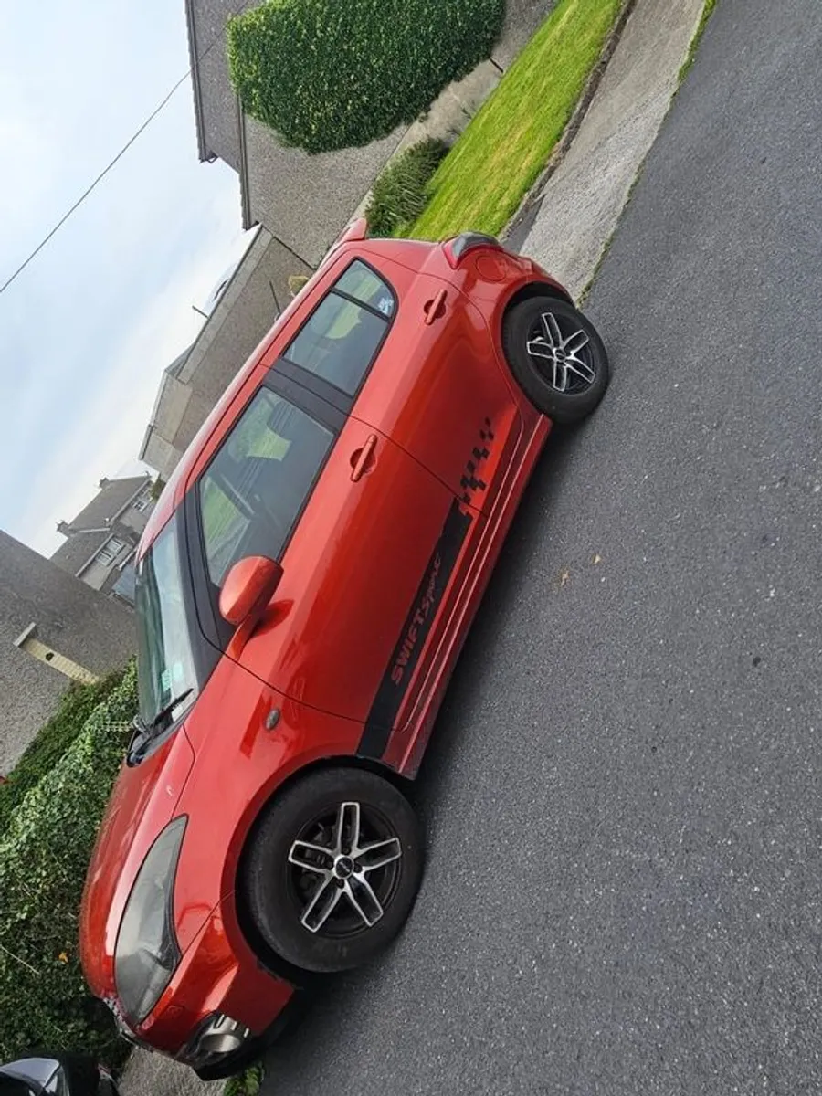 2013 Suzuki Swift - Image 1