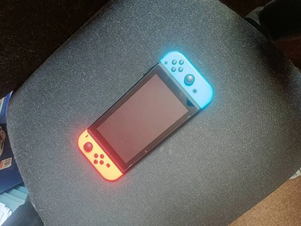 Nintendo Switch, 128gb extra storage and 2 games - Image 1