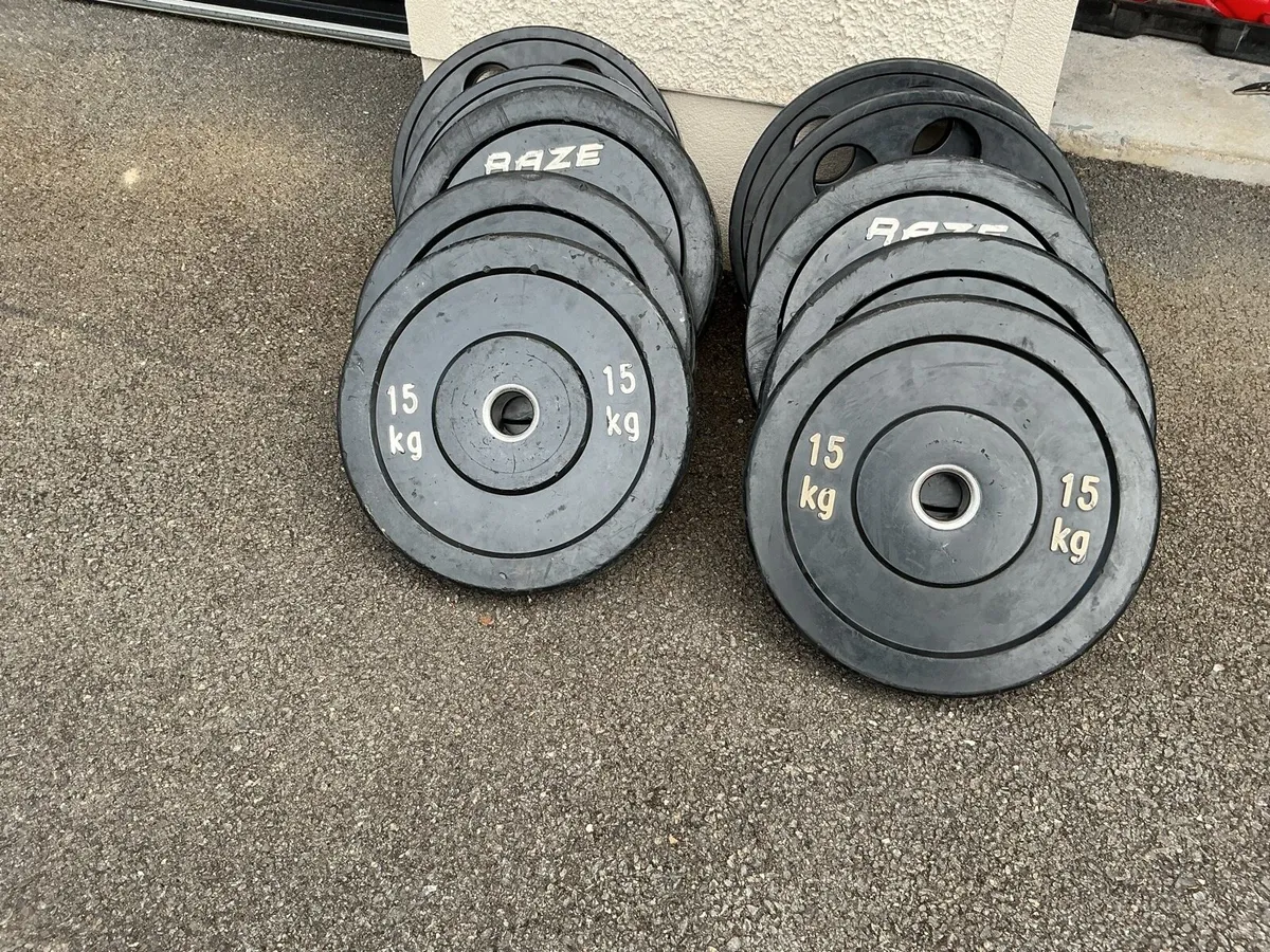 Olympic 220kg bumper weightlifting plates - Image 1