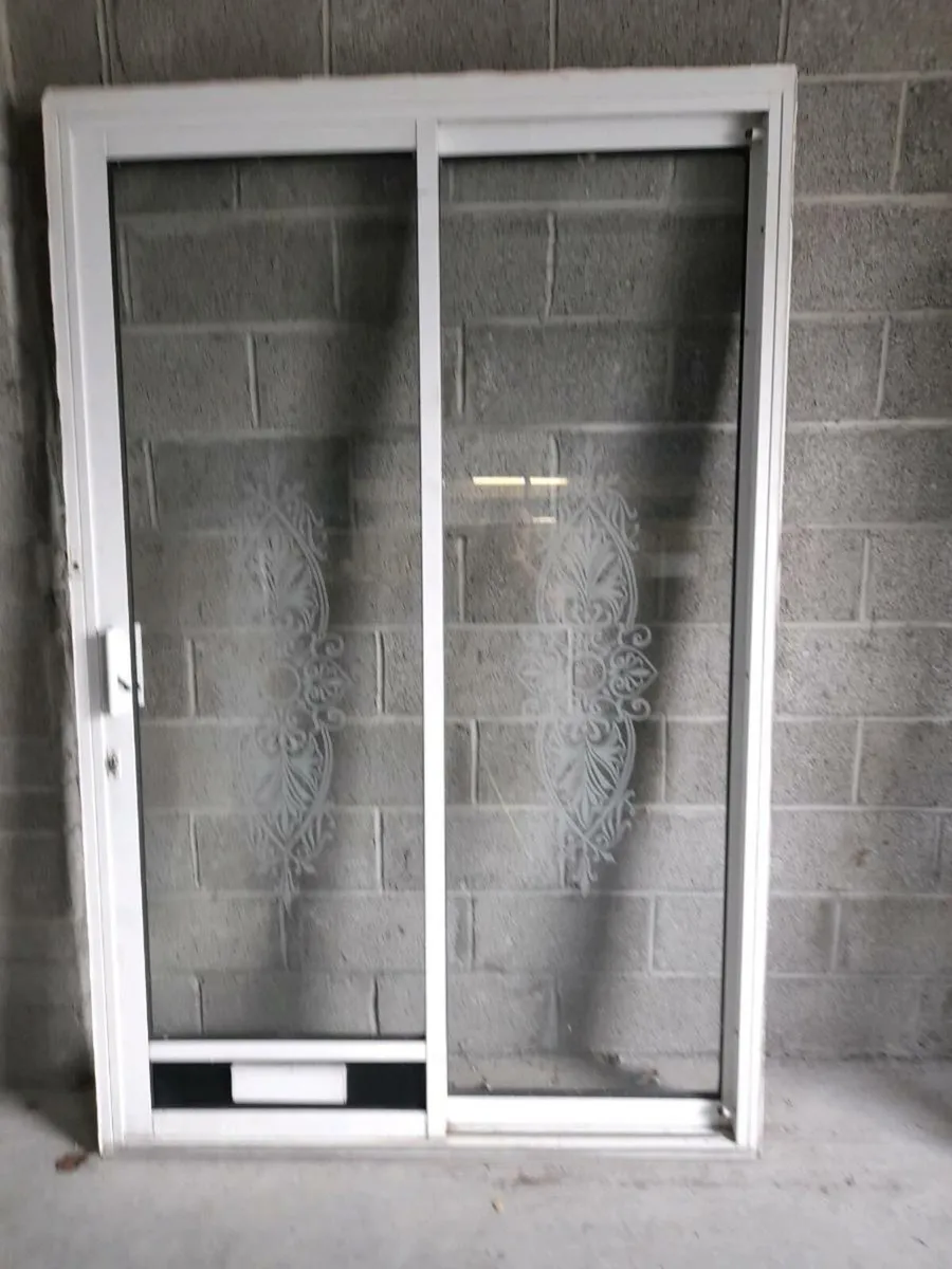Pvc door and aluminium patio.. - Image 1