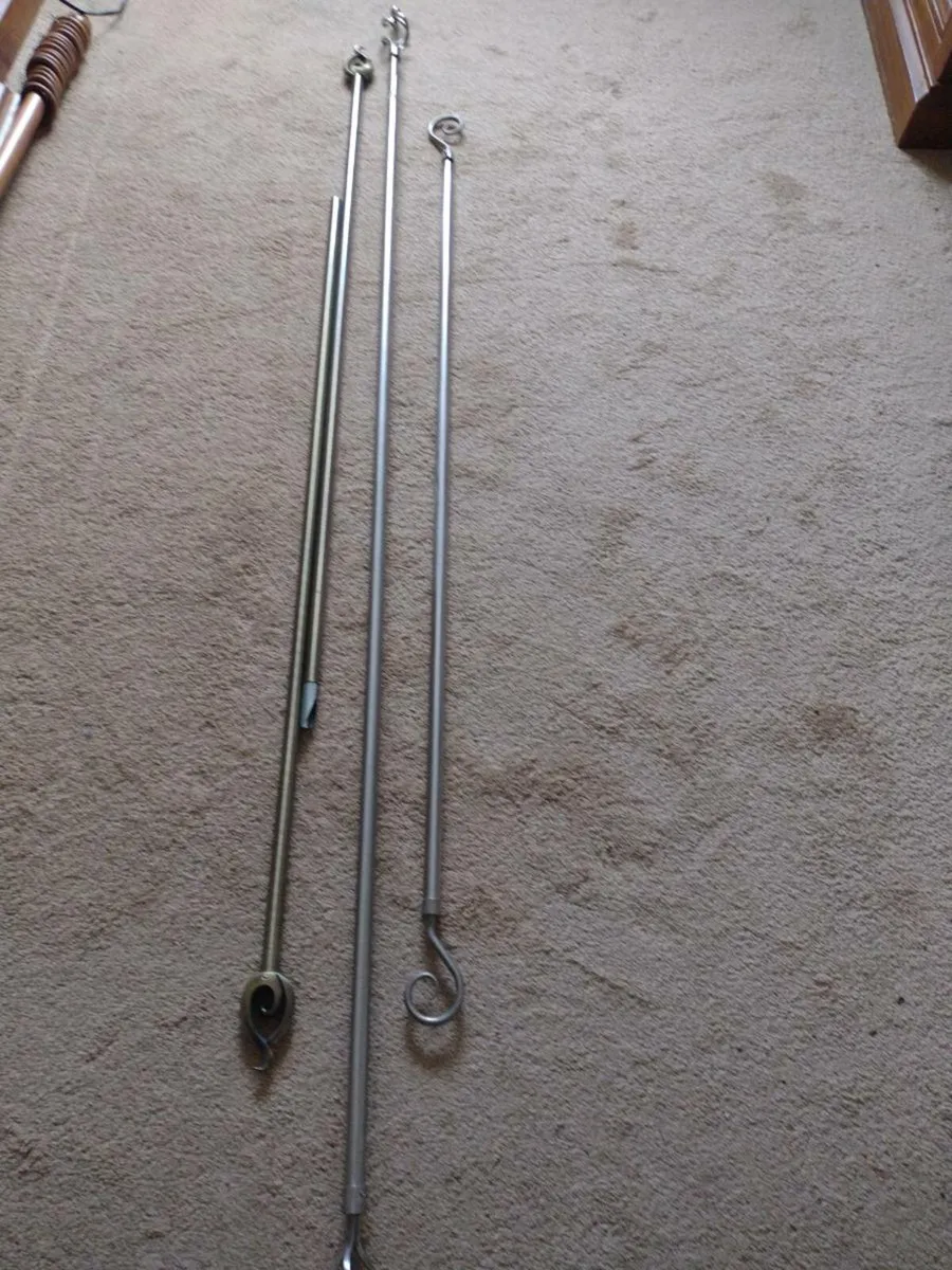 Brass and silver curtain poles