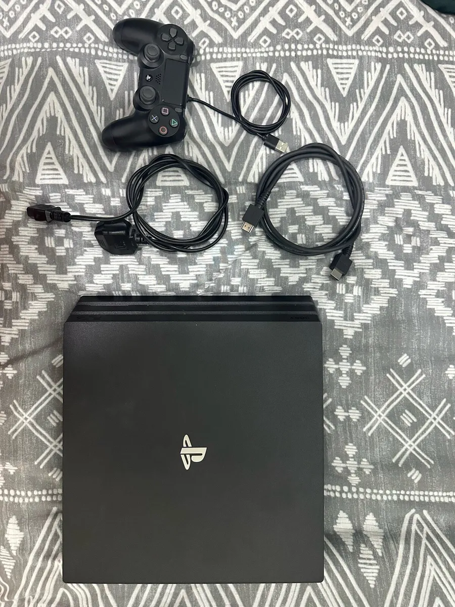 PS4 Pro 1Tb & wall mount . - Image 1