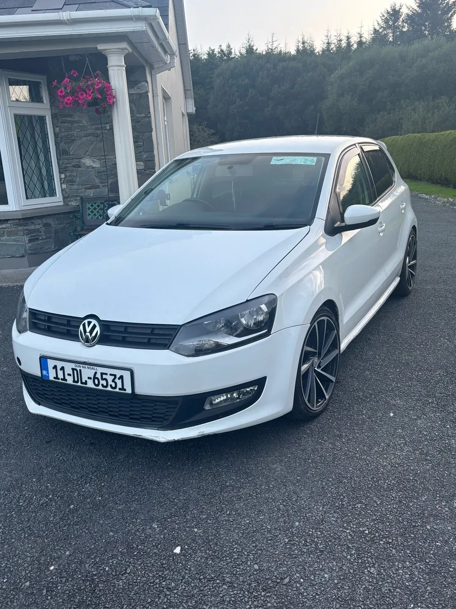 2011 White Volkswagen Polo - Image 1