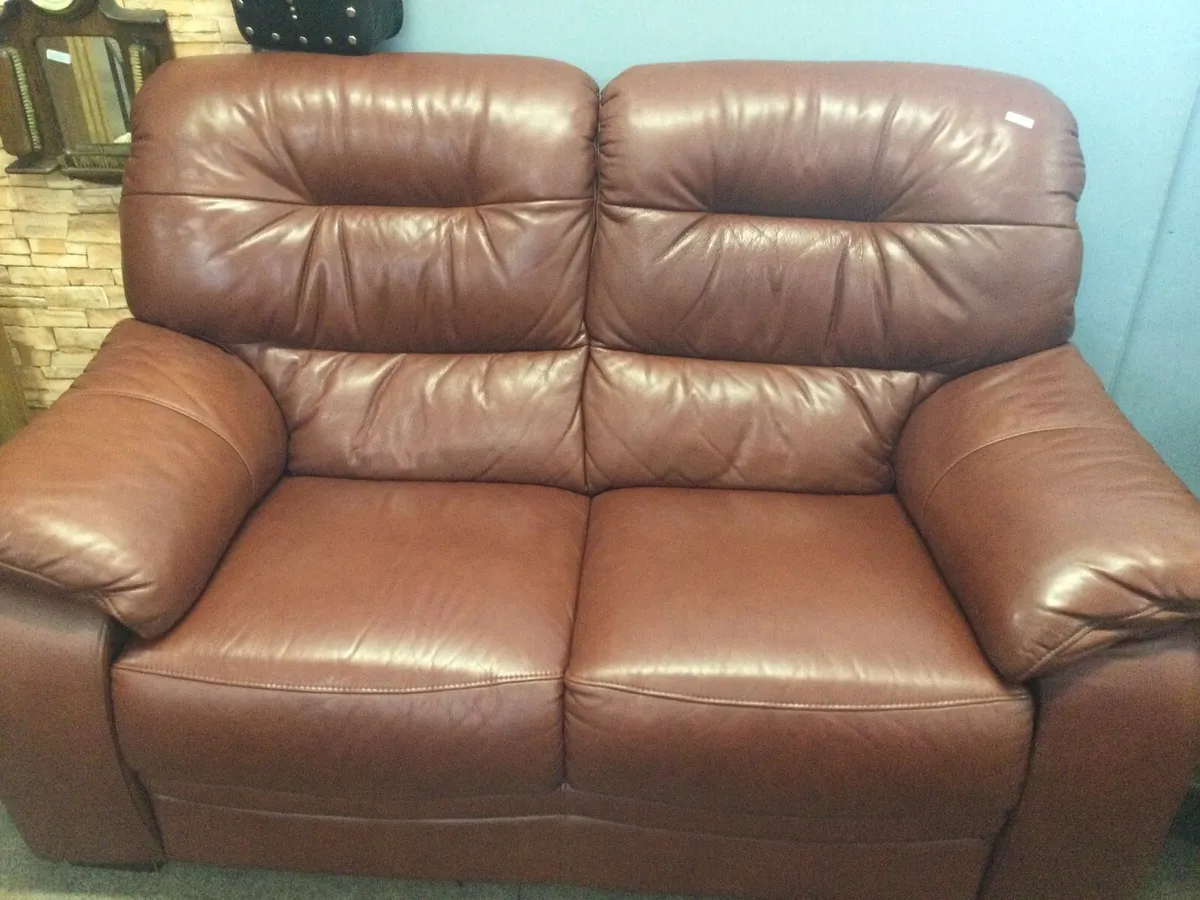 A large two seater leather sofa