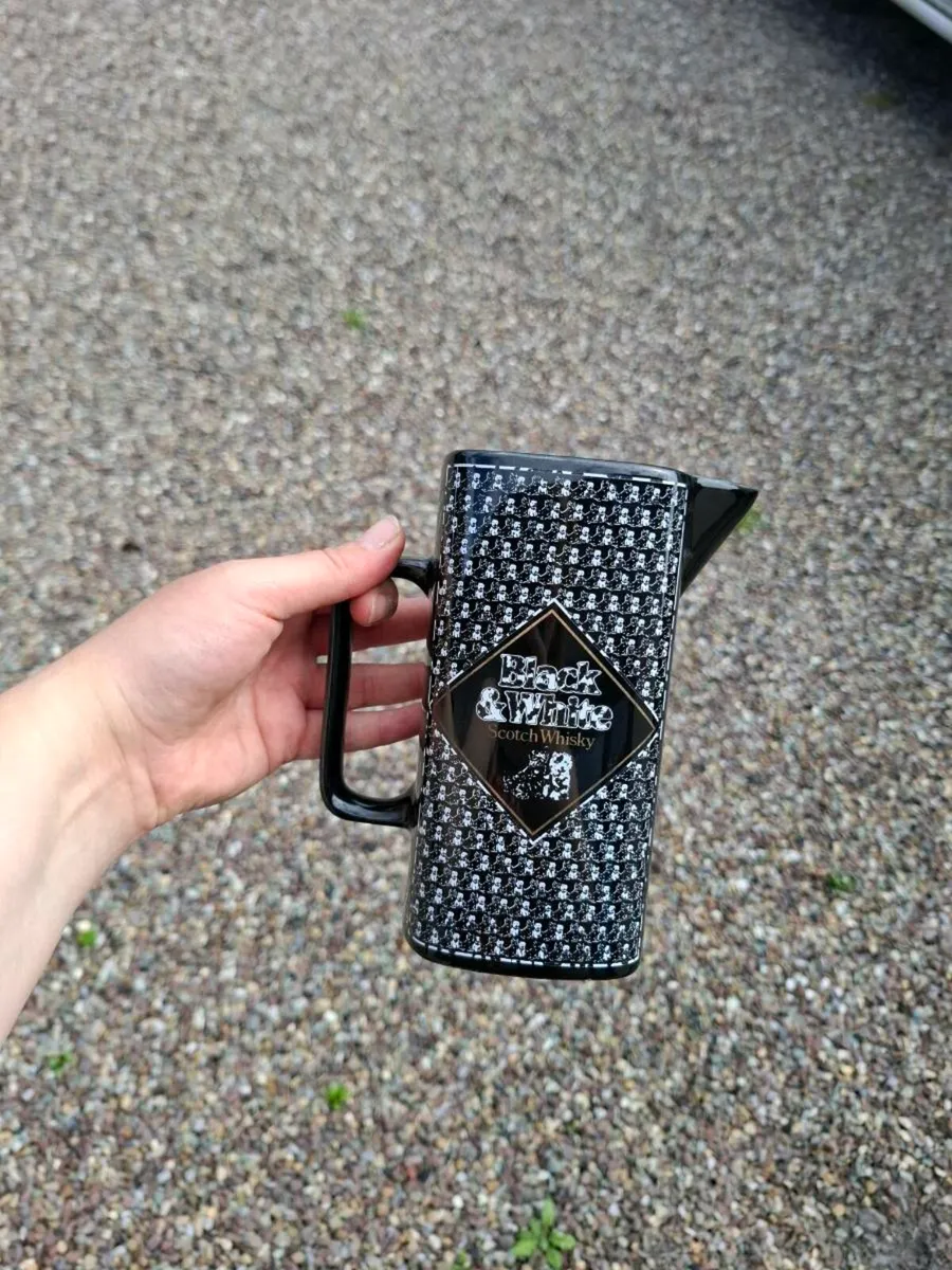 Black and white whiskey pitcher postage possible