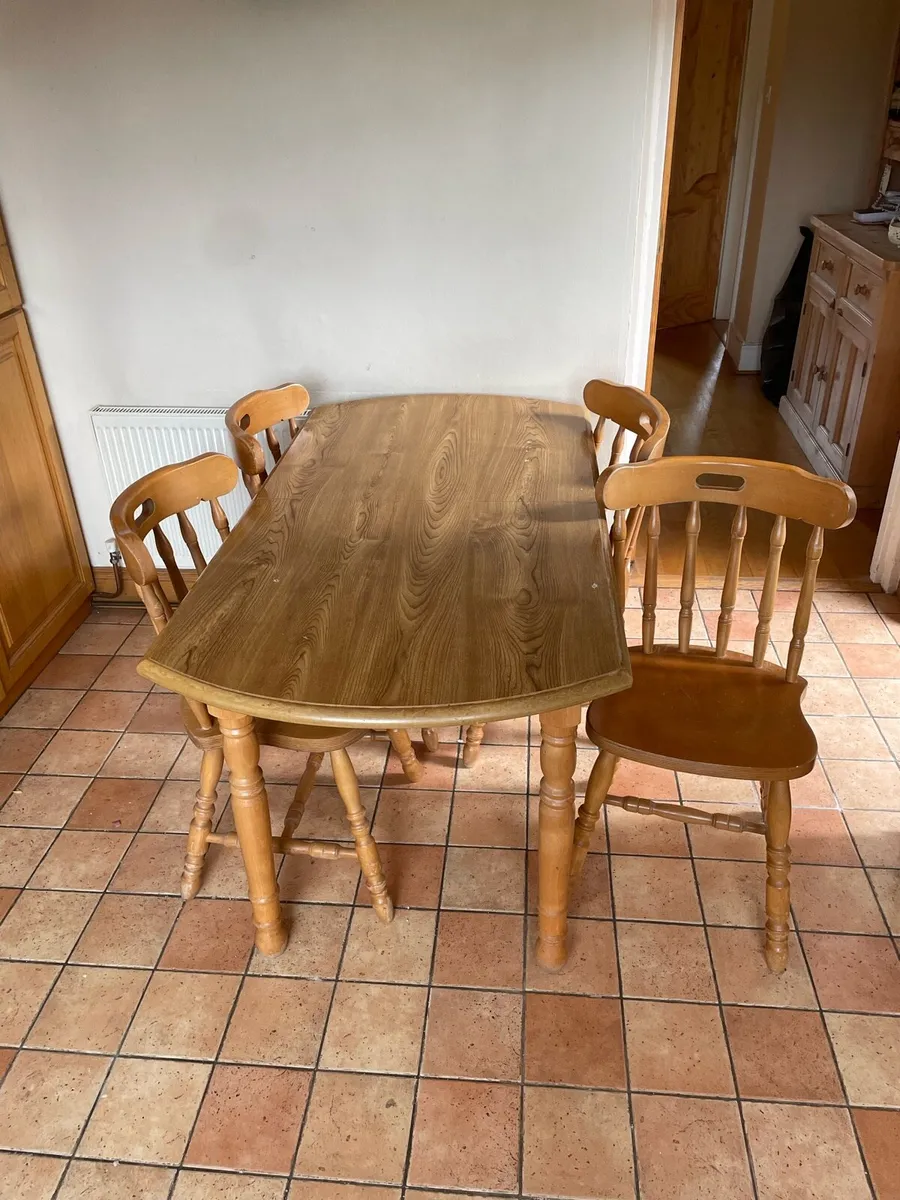 Solid pine table and 4 matching chairs