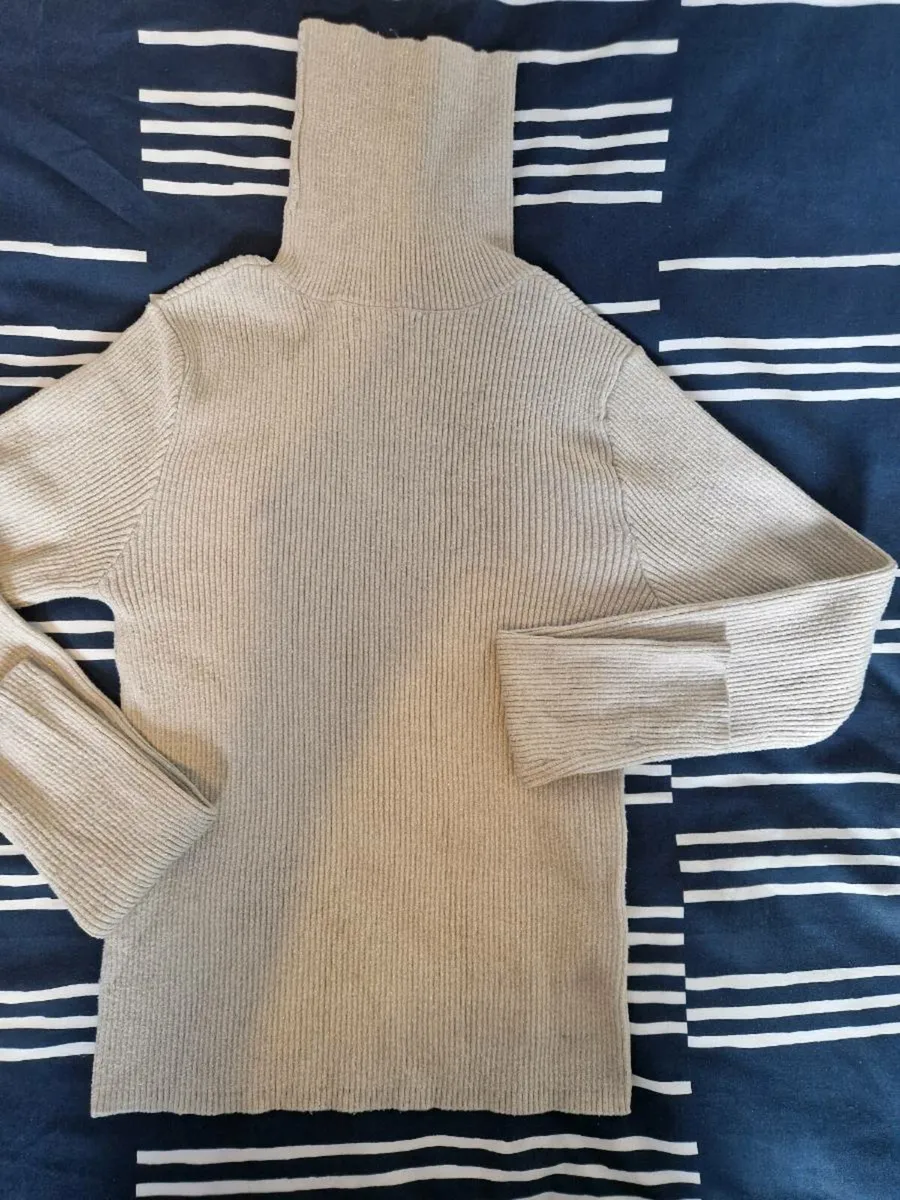 Cream turtleneck sweater - Image 1