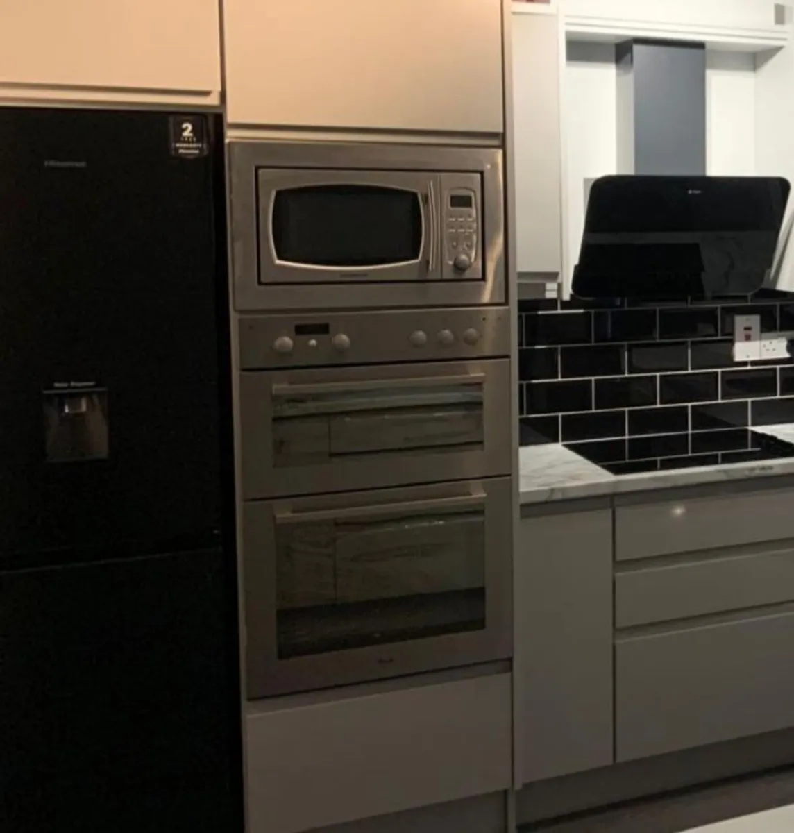 Integrated oven, grill and microwave