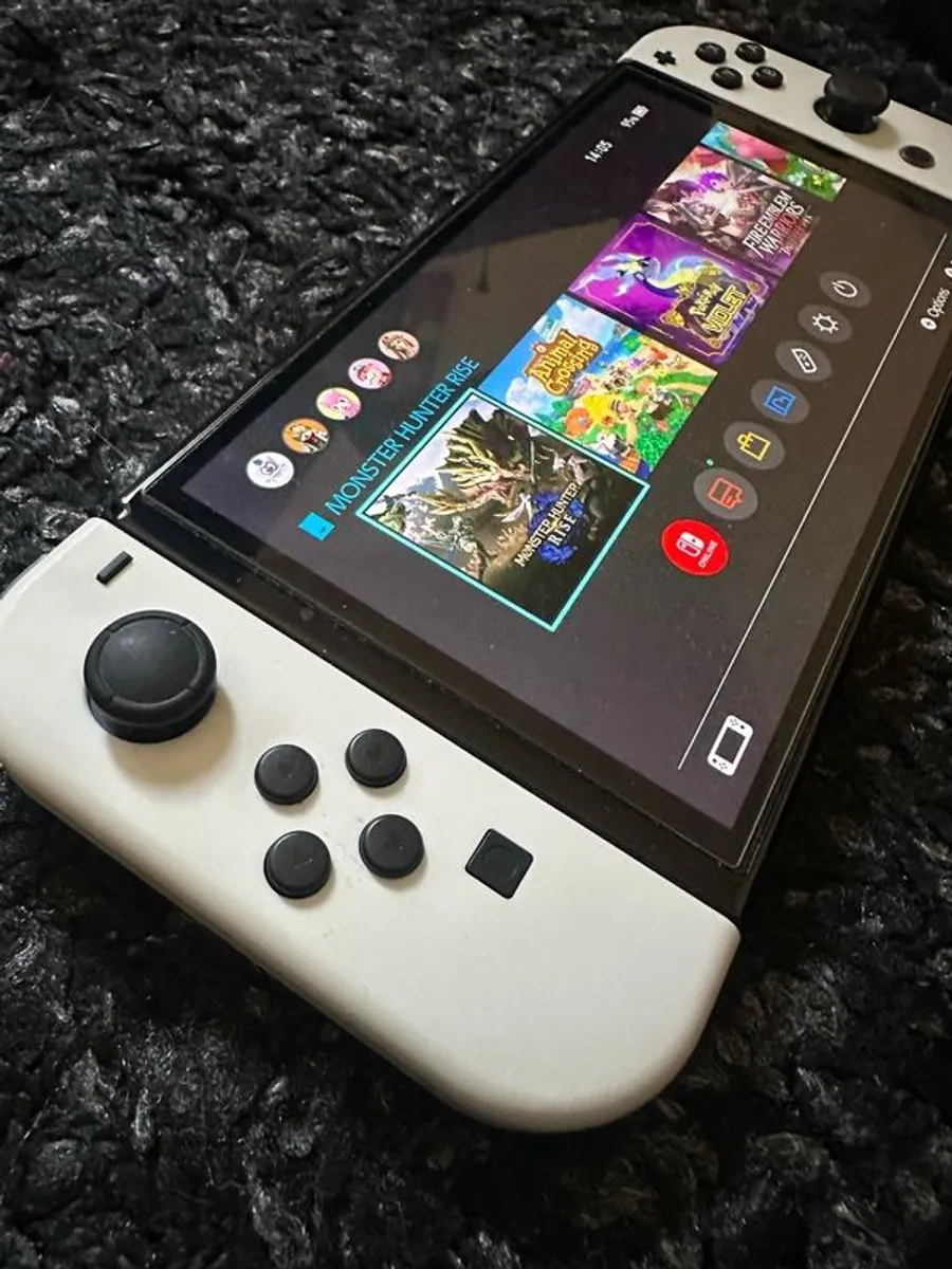 Nintendo Switch OLED (White) + 4 Popular Games - Image 2