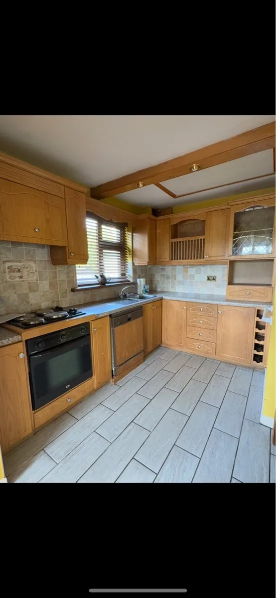 Kitchen including appliances