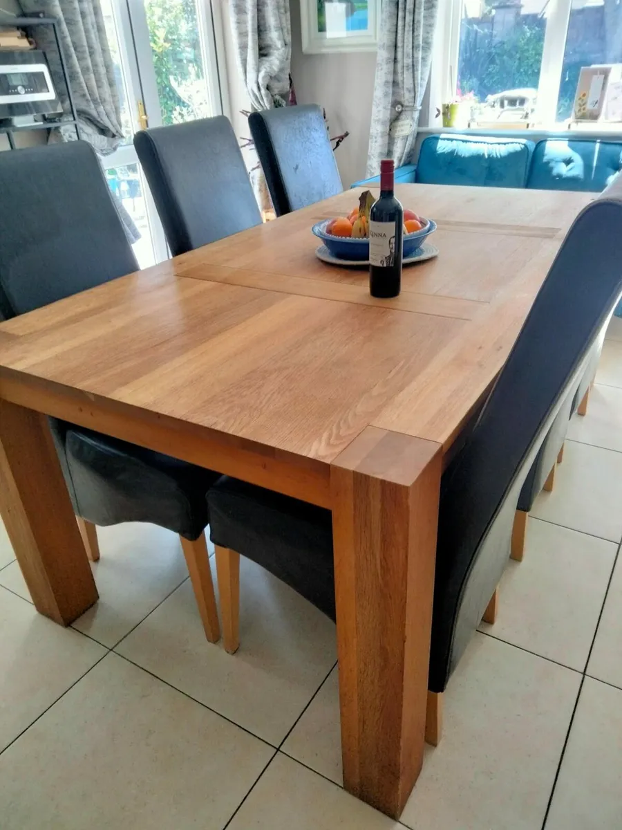 Table and 6 leather chairs
