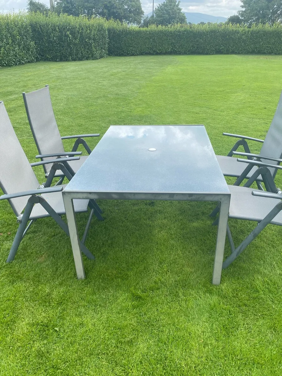 Patio table and chairs - Image 1
