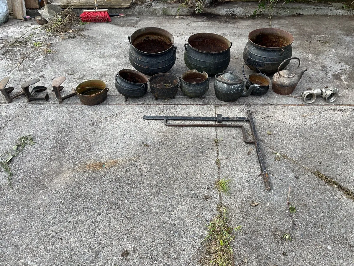 Old cast-iron pots, kettles and cobbler shoe lasts - Image 1