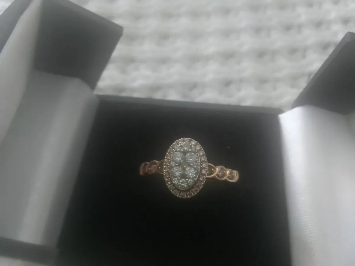 9ct ROSE GOLD DIAMOND OVAL HALO RING ON HOLD - Image 1