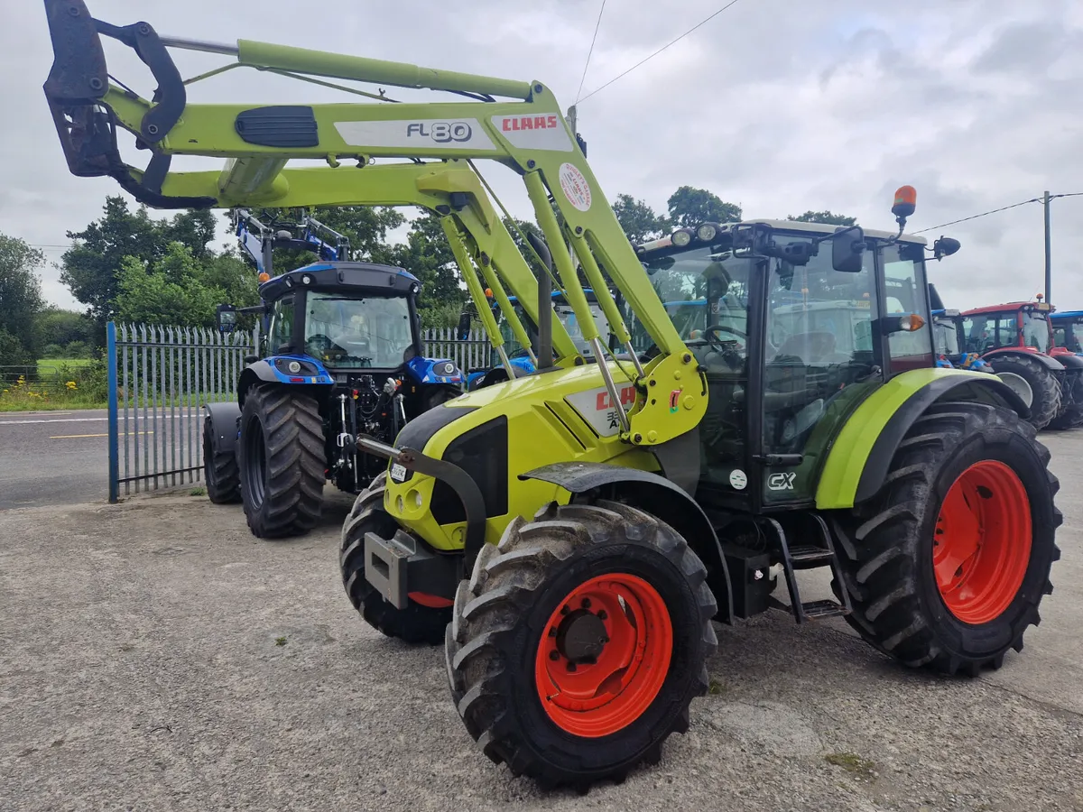 131 Claas Axos 330 - Image 1