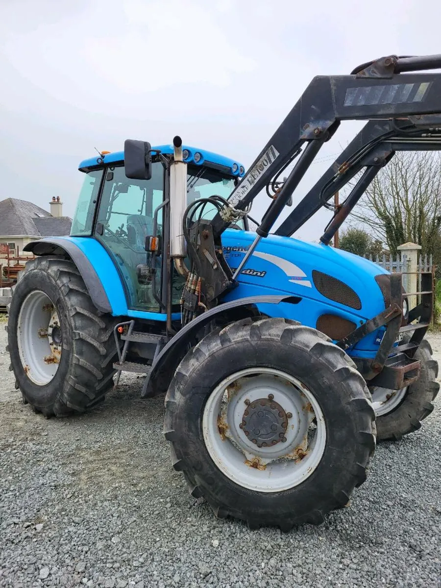 Tractor and front loader - Image 1