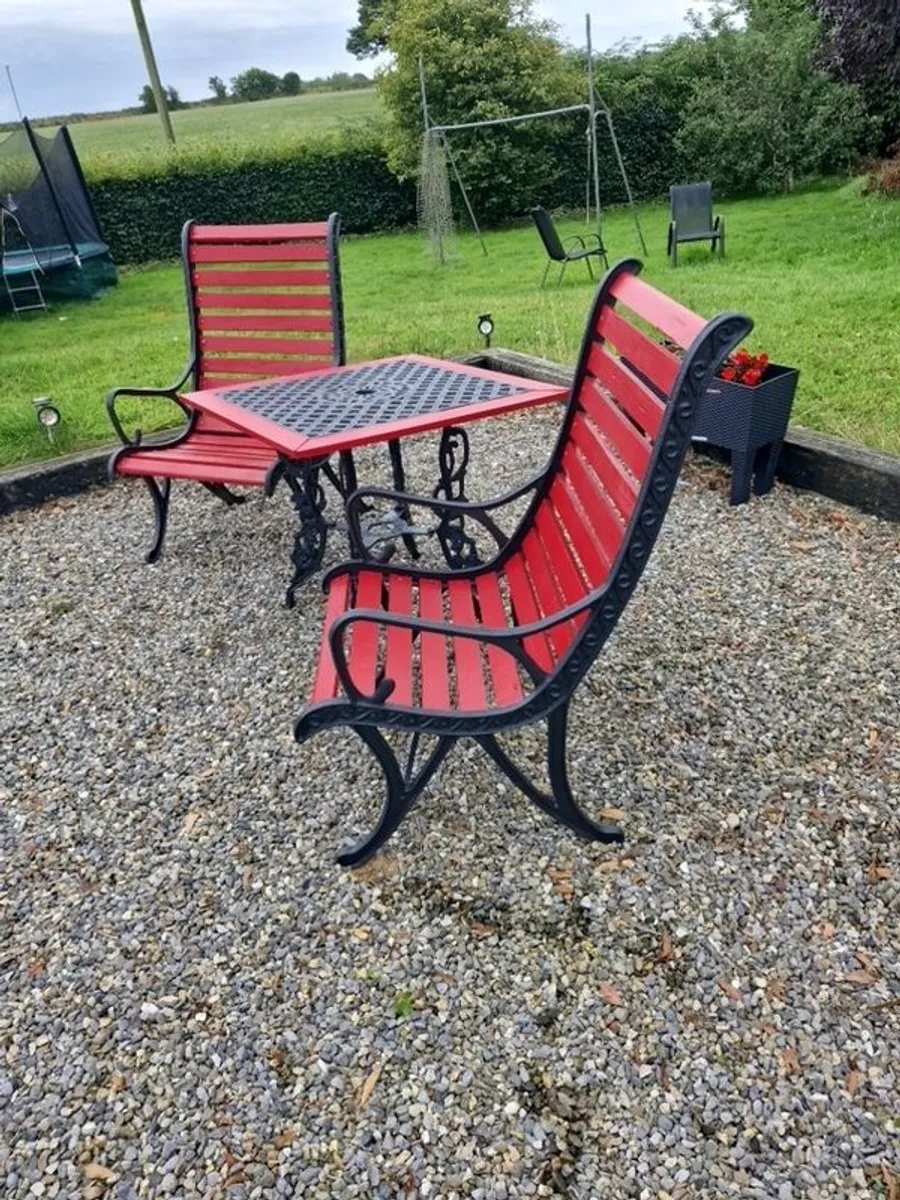Heavy cast iron table and two high back chairs - Image 2