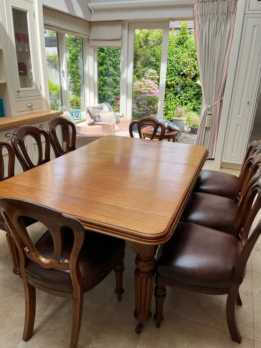 Dining table and 8 chairs